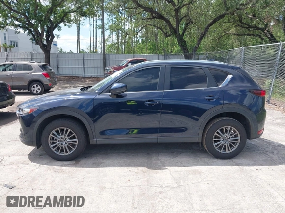 2017 Mazda CX-5 Touring with VIN JM3KFACL0H0227615, listed as a IAAI auction lot 42063618 with 72,291 mi miles. Bid and sale history available at carsss.com. Image 14.