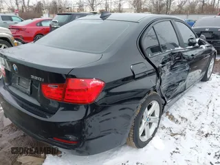 2015 BMW 3 Series 320i xDrive with VIN WBA3C3C55FP664465, listed as a IAAI auction lot 41608096 with 67,911 mi miles and . Bid and sale history available at DreamBid. Image 4.