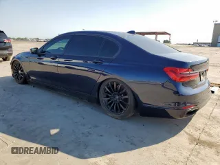 2016 BMW 7 Series 740i z VIN WBA7E2C55GG504304, wystawiony jako Copart lot #59251345 z przebiegiem 115 942 mil mil oraz Czysty tytuł • Clean title. Historia ofert i sprzedaży dostępna na DreamBid. Obrazek 2.