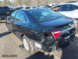 2015 Toyota Camry Hybrid LE with VIN 4T1BD1FK7FU167027, listed as a IAAI auction lot 41697235 with 253,152 mi miles. Bid and sale history available at carsss.com. Image 3.