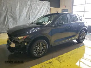 2021 Mazda CX-5 Touring with VIN JM3KFACMXM0334139, listed as a Copart auction lot 55362905 with 117,279 mi miles and Clean Title. Bid and sale history available at DreamBid. Image 1.