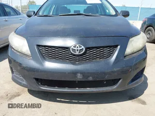 2009 Toyota Corolla with VIN 1NXBU40E89Z056754, listed as a IAAI auction lot 41989594 with 187,890 mi miles. Bid and sale history available at carsss.com. Image 6.
