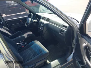 1999 Honda CR-V EX with VIN JHLRD1860XC056641, listed as a IAAI auction lot 42018329 with 321,707 mi miles. Bid and sale history available at carsss.com. Image 5.