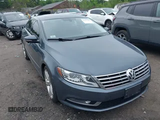 2013 Volkswagen CC Sport with VIN WVWBP7AN0DE509571, listed as a IAAI auction lot 42511411 with 119,486 mi miles and . Bid and sale history available at DreamBid. Image 1.