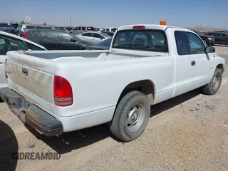 2002 Dodge Dakota with VIN 1B7GL12X32S701273, listed as a IAAI auction lot 41552573 with 157,212 mi miles and . Bid and sale history available at carsss.com. Image 4.