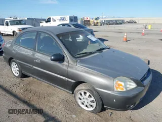 2004 Kia Rio with VIN KNADC125246339415, listed as a IAAI auction lot 41978078 with 127,727 mi miles. Bid and sale history available at carsss.com. Image 1.