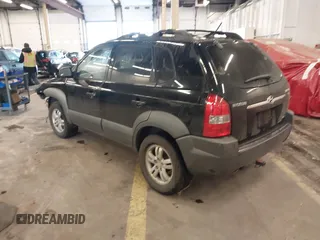 2007 Hyundai Tucson SE with VIN KM8JN72D47U670938, listed as a IAAI auction lot 41620857 with 129,769 mi miles and . Bid and sale history available at DreamBid. Image 3.
