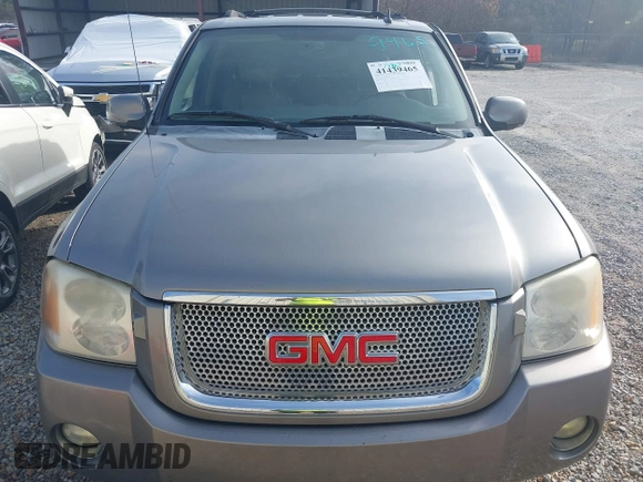 2006 GMC Envoy Denali with VIN 1GKES63MX62154590, listed as a IAAI auction lot 41439465 with 258,975 mi miles. Bid and sale history available at carsss.com. Image 6.