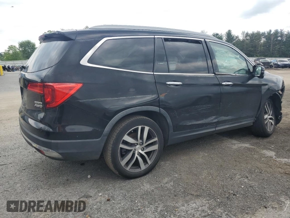 2017 Honda Pilot Touring with VIN 5FNYF6H90HB024321, listed as a Copart auction lot 57459895 with 134,244 mi miles and Salvage title. Bid and sale history available at DreamBid. Image 3.
