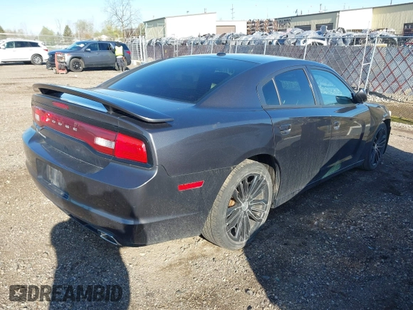 2013 Dodge Charger SXT with VIN 2C3CDXHG3DH593614, listed as a IAAI auction lot 42138282 with 174,243 mi miles. Bid and sale history available at carsss.com. Image 4.