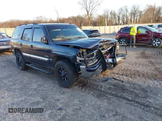2005 GMC Yukon SLT with VIN 1GKEC13T55R141498, listed as a IAAI auction lot 41078315 with 274,404 mi miles. Bid and sale history available at carsss.com. Image 1.