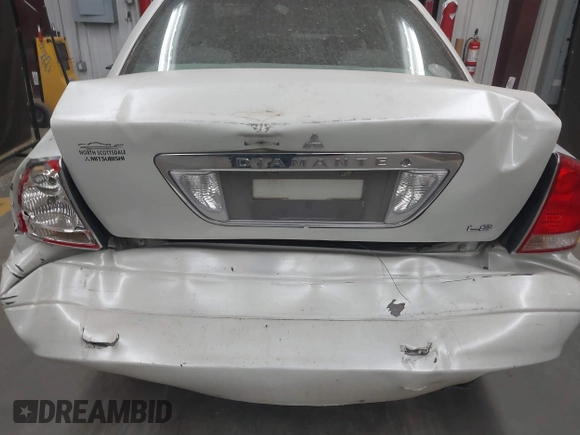 2003 Mitsubishi Diamante LS z VIN 6MMAP67P13T012396, wystawiony jako IAAI lot #40668729 z przebiegiem 157 250 mil mil oraz . Historia ofert i sprzedaży dostępna na DreamBid. Obrazek 17.