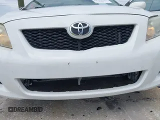 2009 Toyota Corolla with VIN JTDBL40E599027710, listed as a IAAI auction lot 42744831 with 112,043 mi miles and . Bid and sale history available at DreamBid. Image 6.