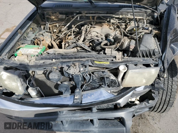 2000 Nissan Frontier XE z VIN 1N6ED26T5YC313494, wystawiony jako Copart lot #46549935 z przebiegiem 271 425 mil mil oraz Szkoda całkowita • Salvage title. Historia ofert i sprzedaży dostępna na DreamBid. Obrazek 13.