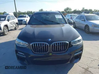 2019 BMW X3 M40i with VIN 5UXTS3C59KLR72809, listed as a IAAI auction lot 41893066 with 39,654 mi miles and . Bid and sale history available at DreamBid. Image 12.