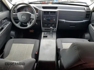 2010 Jeep Liberty Sport with VIN 1J4PN2GK3AW105918, listed as a Copart auction lot 63023885 with 199,366 mi miles and Salvage title. Bid and sale history available at DreamBid. Image 8.
