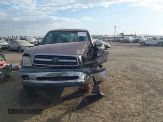 2000 Toyota Tundra SR5 with VIN 5TBRT3411YS002814, listed as a IAAI auction lot 41253815 with 155,327 mi miles and . Bid and sale history available at DreamBid. Image 12.