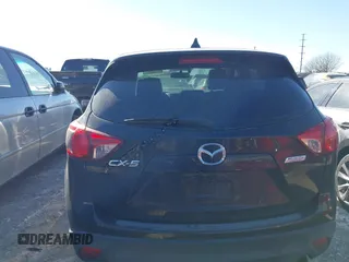 2013 Mazda CX-5 Grand Touring with VIN JM3KE2DE1D0164723, listed as a IAAI auction lot 41364590 with 227,932 mi miles. Bid and sale history available at carsss.com. Image 17.