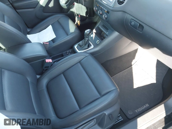2016 Volkswagen Tiguan S with VIN WVGBV7AX3GW522378, listed as a IAAI auction lot 41391294 with 106,278 mi miles and . Bid and sale history available at DreamBid. Image 5.