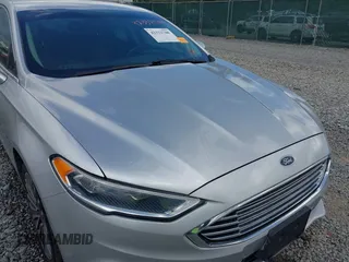 2017 Ford Fusion Titanium with VIN 3FA6P0K99HR112234, listed as a IAAI auction lot 42332700 with 106,685 mi miles and . Bid and sale history available at DreamBid. Image 17.