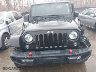 2015 Jeep Wrangler Unlimited Rubicon Hard Rock with VIN 1C4HJWFG9FL569962, listed as a IAAI auction lot 41557801 with 78,597 mi miles. Bid and sale history available at carsss.com. Image 12.