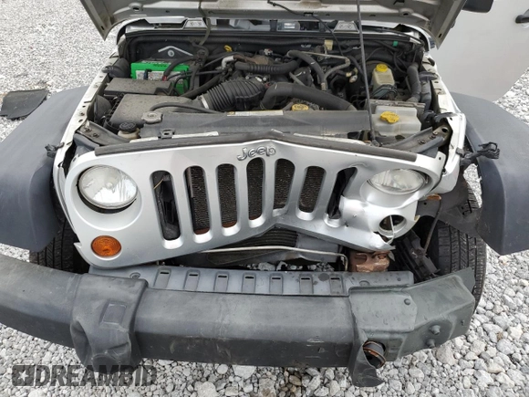 2007 Jeep Wrangler Unlimited X with VIN 1J4GA39117L169245, listed as a Copart auction lot 56731665 with 136,247 mi miles and Salvage title. Bid and sale history available at DreamBid. Image 12.