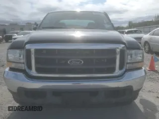 2002 Ford F-250 XL with VIN 3FTNW20F72MA07306, listed as a Copart auction lot 80054914 with 182,808 mi miles and Salvage Title. Bid and sale history available at DreamBid. Image 5.