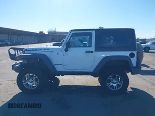 2011 Jeep Wrangler Rubicon with VIN 1J4HA6D17BL620734, listed as a IAAI auction lot 41219266 with 83,796 mi miles and . Bid and sale history available at carsss.com. Image 14.