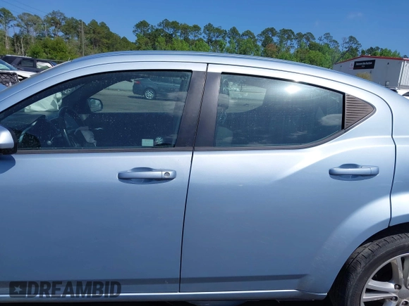 2013 Dodge Avenger SXT with VIN 1C3CDZCB0DN521591, listed as a IAAI auction lot 41891451 with 100,234 mi miles and . Bid and sale history available at carsss.com. Image 14.