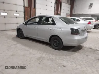 2008 Toyota Yaris with VIN JTDBT903781251568, listed as a IAAI auction lot 42090260 with 264,356 mi miles. Bid and sale history available at carsss.com. Image 3.