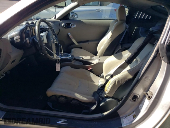 2004 Nissan 350Z Touring with VIN JN1AZ34E64T060440, listed as a Copart auction lot 79082914 with 178,742 mi miles and Salvage Title. Bid and sale history available at carsss.com. Image 7.