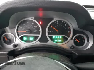 2007 Jeep Wrangler Unlimited Rubicon с VIN 1J8GA691X7L191115, выставлен на аукционе Copart как лот 87523925 с пробегом 85 709 миль миль и Списание • Salvage title. История ставок и продаж доступна на DreamBid. Изображение 9.