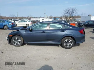 2020 Honda Civic LX z VIN 2HGFC2F61LH570034, wystawiony jako IAAI lot #41784357 z przebiegiem Nie podano mil oraz . Historia ofert i sprzedaży dostępna na DreamBid. Obrazek 13.