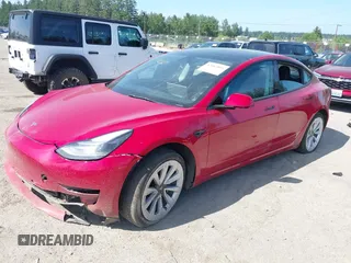2022 Tesla Model 3 Long Range z VIN 5YJ3E1EB5NF174606, wystawiony jako IAAI lot #42463894 z przebiegiem 36 677 mil mil oraz . Historia ofert i sprzedaży dostępna na DreamBid. Obrazek 2.