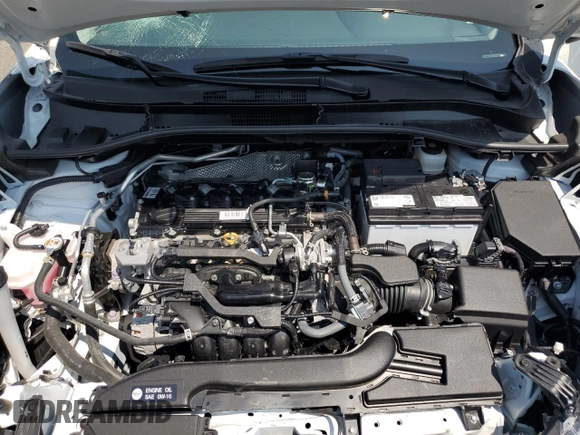 2023 Toyota Corolla Cross XLE with VIN 7MUDAABGXPV060797, listed as a Copart auction lot 62110665 with 18,293 mi miles and Salvage title. Bid and sale history available at DreamBid. Image 12.