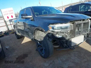 2023 Ram 1500 Limited with VIN 1C6SRFHMXPN504441, listed as a IAAI auction lot 41384101 with 21,601 mi miles and . Bid and sale history available at DreamBid. Image 1.