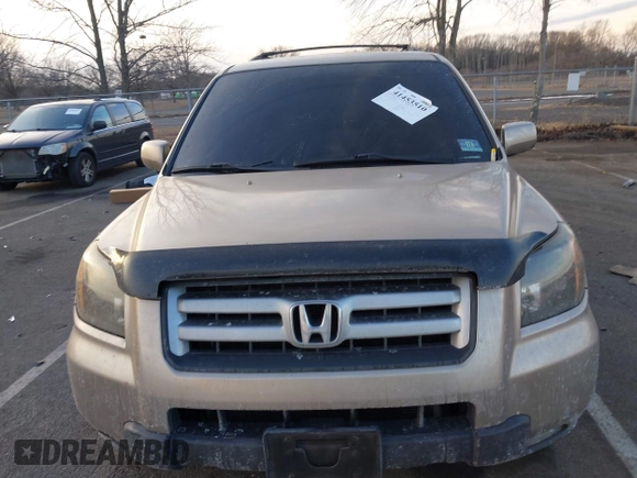 2007 Honda Pilot EX-L with VIN 2HKYF18667H509331, listed as a IAAI auction lot 41453510 with 228,746 mi miles and . Bid and sale history available at DreamBid. Image 12.