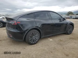 2023 Tesla Model Y Long Range with VIN 7SAYGDEE1PF923998, listed as a Copart auction lot 48954205 with 21,525 mi miles and Salvage Title. Bid and sale history available at DreamBid. Image 3.