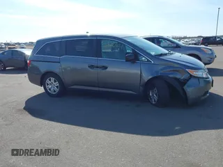 2012 Honda Odyssey LX with VIN 5FNRL5H24CB145694, listed as a IAAI auction lot 41902821 with 134,402 mi miles and . Bid and sale history available at carsss.com. Image 13.