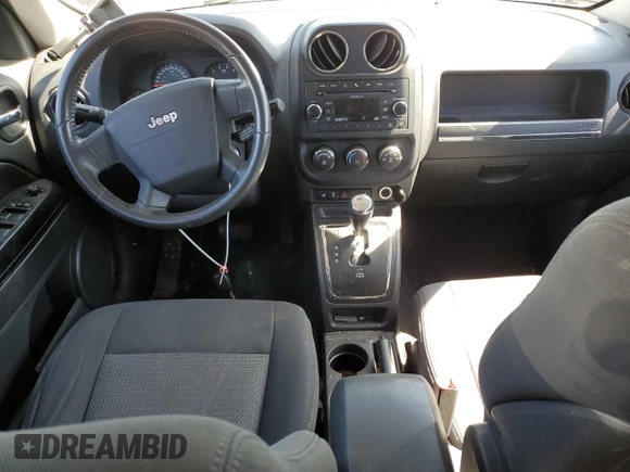 2010 Jeep Patriot Sport with VIN 1J4NF2GB6AD622212, listed as a Copart auction lot 52601705 with 218,001 mi miles and Clean Title. Bid and sale history available at carsss.com. Image 8.