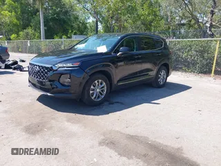 2019 Hyundai Santa Fe SE with VIN 5NMS23AD4KH088902, listed as a IAAI auction lot 42044465 with 34,302 mi miles and . Bid and sale history available at DreamBid. Image 17.