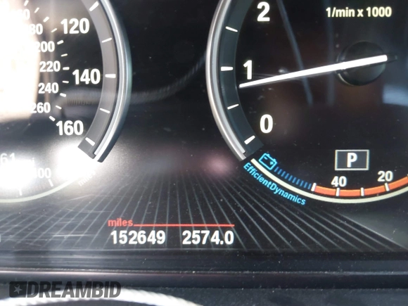 2015 BMW 5 Series 535i xDrive with VIN WBA5B3C58FD547704, listed as a IAAI auction lot 41764129 with 152,649 mi miles. Bid and sale history available at carsss.com. Image 16.