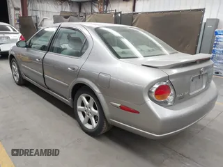 2002 Nissan Maxima GLE with VIN JN1DA31D32T422365, listed as a IAAI auction lot 41644137 with 165,157 mi miles and . Bid and sale history available at DreamBid. Image 3.
