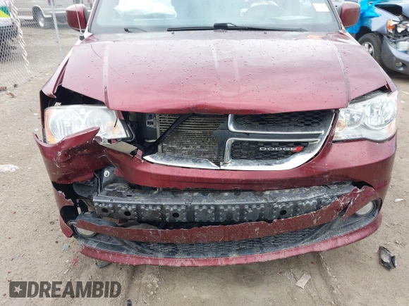 2017 Dodge Grand Caravan SXT with VIN 2C4RDGCG2HR713769, listed as a IAAI auction lot 42074875 with 184,241 mi miles and . Bid and sale history available at DreamBid. Image 6.