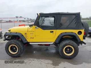 2000 Jeep Wrangler SE with VIN 1J4FA29P5YP705215, listed as a IAAI auction lot 41920532 with 92,927 mi miles and . Bid and sale history available at DreamBid. Image 15.