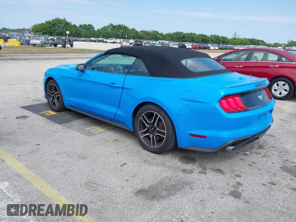 2022 Ford Mustang EcoBoost with VIN 1FATP8UH7N5124791, listed as a IAAI auction lot 41810238 with 57,185 mi miles. Bid and sale history available at carsss.com. Image 3.