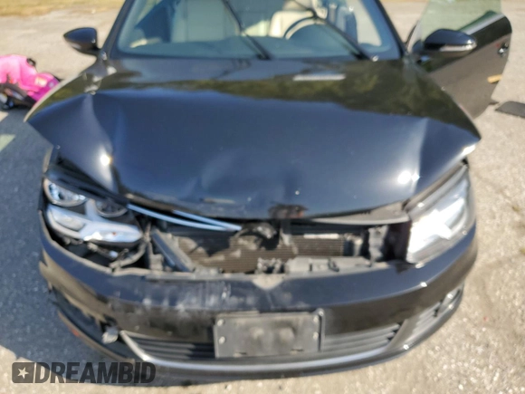 2012 Volkswagen Eos Komfort with VIN WVWBW7AH0CV001922, listed as a Copart auction lot 54378035 with 95,960 mi miles and Salvage Title. Bid and sale history available at DreamBid. Image 11.