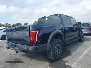 2020 Ford F-150 Raptor with VIN 1FTFW1RG2LFA30858, listed as a IAAI auction lot 42192391 with 90,018 mi miles and . Bid and sale history available at carsss.com. Image 4.
