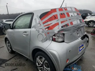 2013 Scion iQ with VIN JTNJJXB08DJ025554, listed as a Copart auction lot 88923885 with 110,378 mi miles and Salvage title. Bid and sale history available at DreamBid. Image 2.