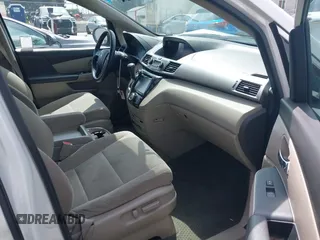2016 Honda Odyssey SE with VIN 5FNRL5H33GB043303, listed as a IAAI auction lot 42215233 with 67,097 mi miles and . Bid and sale history available at DreamBid. Image 5.